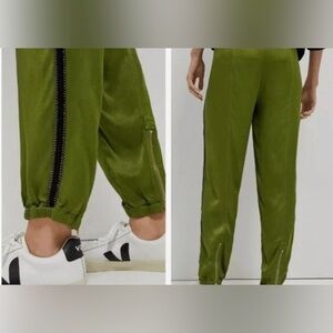 Anthropologie Green Joggers with Black and gold Zipper Detail